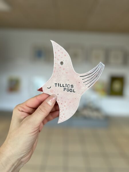 keramikfugl med titel Tillidsfugl