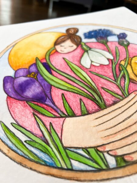 Kvinde med forårsblomster